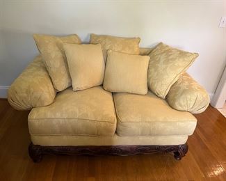 Sofa and Loveseat.  Traditional style, pillow back sofa and loveseat with rolled arms in a soft maize colored upholstery.  Beautiful carved wood base.  Deep seats. Rarely used. Smoke-free and pet-free home.
Price:  $750