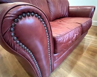 Leather Sofa Set. This set includes a sofa, loveseat, chair and two ottomans in a burgundy color with nail head detail.  Very comfortable, deep seats.  Excellent condition. Smoke-free and pet-free home.
Price:  $2,500