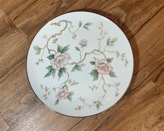 The plate pictured is Noritake- pattern is Chatham. There are 12 five -piece place setting available as well as some additional pieces.