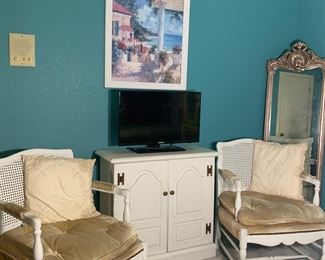 The cane back chairs will work in any room of the house.