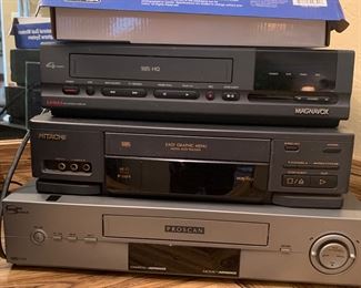 Magnavox VHS, Hitachi VHS/VCR High fi Stereo, and Proscar VCR Gold
