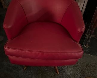 One of a pair of Red Swivel Chairs