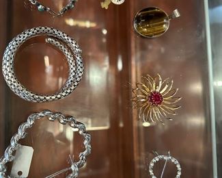 Vintage pins 
Silver John hardy snake bracelet 