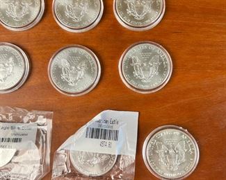 Lot of 12 American Silver Eagle 1oz .999 Silver Coins	331338