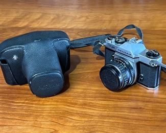 Asahi Pentax KM 35mm SLR Film Camera w/ 55mm f/1.8 Lens	333387	3.75x5.5x3.75