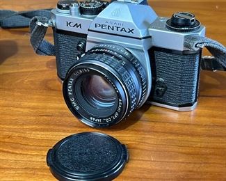 Asahi Pentax KM 35mm SLR Film Camera w/ 55mm f/1.8 Lens	333387	3.75x5.5x3.75