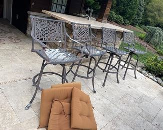 4 Fortunoff patio bar stools 
