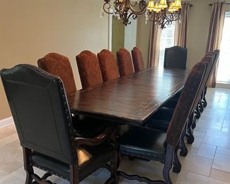 GORGEOUS Sprawling WOOD Table that seats 12 people perfectly in the oversized chairs!!        $2000
📌 Shown with 2 leaves in it.
144” long with both leaves
(leaves are 18” each) 
45” wide 
12 chairs (2 of them are arm chairs) 
