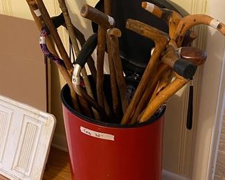 Trash can + canes & walking sticks