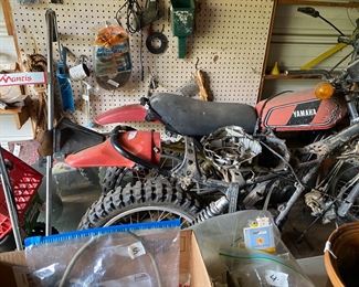 Small metal building outside behind the house