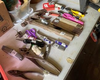 Small metal building outside behind the house