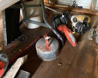 Small metal building outside behind the house