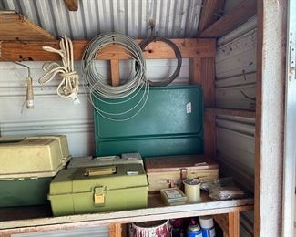 Small metal building outside behind the house