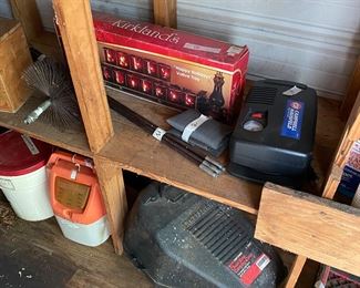 Small metal building outside behind the house