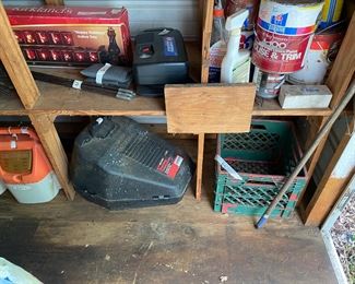 Small metal building outside behind the house