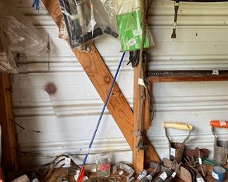 Small metal building outside behind the house