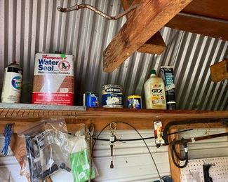 Small metal building outside behind the house