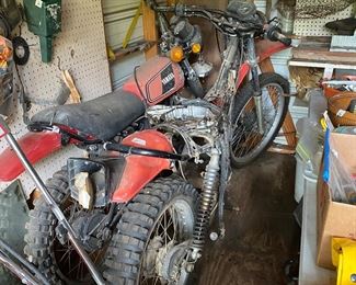 Small metal building outside behind the house