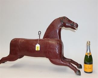 208: Carved wood running horse