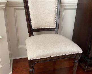 F7 - $850. Universal Furniture table with 8 chairs. Measures 45” wide x 101” long (with 20” leaf in place) x 30.5” tall.  Has table pads to protect the 2. 2 captains chairs and 6 regular. Table & Chairs are in excellent condition. 