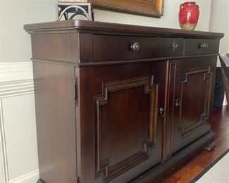F8 $450. Universal Furniture Buffet Cabinet.  Measures 20” wide x 71” long x 47” tall. Excellent Condition. 