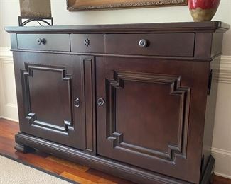 F8 $450. Universal Furniture Buffet Cabinet.  Measures 20” wide x 71” long x 47” tall. Excellent Condition. 