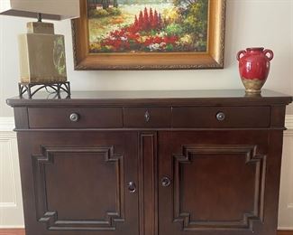 F8 $450. Universal Furniture Buffet Cabinet.  Measures 20” wide x 71” long x 47” tall. Excellent Condition. 