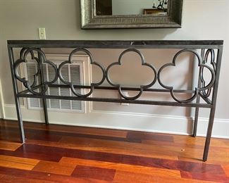 F9 - $350. Universal Furniture measures 17.25” deep x 63” long x 36.5” tall. Metal base with stone top. 