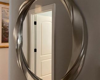 F11 - $30 round silver mirror. Measures 34” round. 