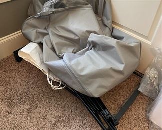 $20. Clothes Rack with cover