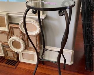F23 - $20 metal and glass plant stand. Measures 12” round x 28” tall. 