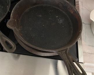 $35. #8 gate marked cast iron with single pour spout. 