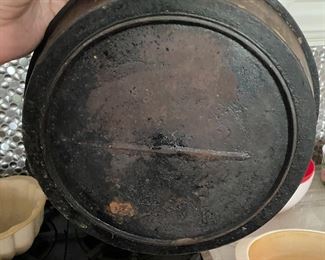 $35. #8 gate marked cast iron with single pour spout. 