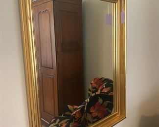 $40. Wall Mirror with gold frame. Measures 28" x 34". 