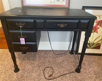 $40. Singer sewing machine in case. Measures 18" x 36" x 29" tall. 