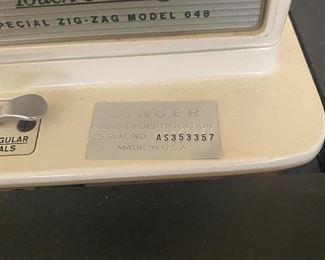 $40. Singer sewing machine in case. Measures 18" x 36" x 29" tall. 