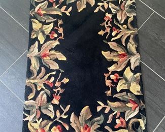 $40. 2' x 3' Wool Rug Black Tropical Border. 