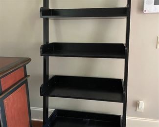 $75. 5 tier leaning wall shelf. Measures 17.5" deep x 33.5" wide x 75" tall. 