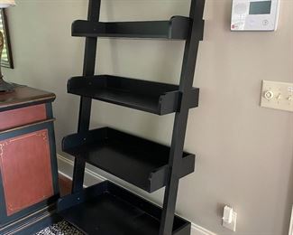 $75. 5 tier leaning wall shelf. Measures 17.5" deep x 33.5" wide x 75" tall. 