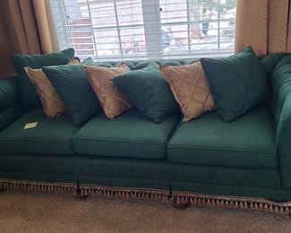Is dark green low profile sofa