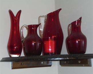 Various red glass vases/pitchers