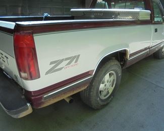 1994 Chevy 1 ton 4 wheel drive/ 2,400 miles on new Jasper engine (under warranty until 3,000 miles)/ 162k miles on truck/ new a/c unit/ seats have no tears, rips or holes/dash is not cracked/ burgundy and silver.