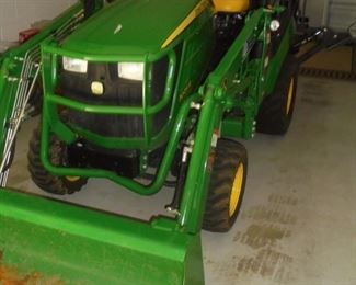 John Deere tractor - 1025R/ 68 total hours/ factory front end loader/ factory back hoe with stabilizers/ 2019.  Always garage kept. 