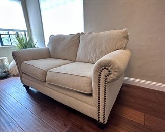 Ashley Furniture Industries Beige Upholstered Sofa
