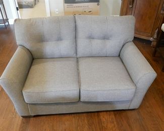 Ashley Furniture Industries Gray Upholstered Couch

