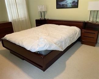 $2500 USD     Mid Century Rosewood Queen Platform Bed Frame SB183-29     Description: Classic Scandinavian soft lines are the essence for this bedroom series.  The queen bed features a wide storage headboard that flips-up to open and two pull-out storage drawers at the foot of the bed for ample storage. Details include solid wood edging and rounded solid corners for superb quality. 

Dimensions: 65 x 92 x 30"H

Condition: Very good condition

See our companion listings for end tables, dresser, chest.

Local pick up Chevy Chase, MD.  Located on second floor.  Contact us for shipper suggestions.     https://goodbyhello.com/products/mid-century-rosewood-king-platform-bed-frame-3-29?_pos=19&_sid=cf2c4dc20&_ss=r