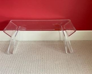 $150 USD      Lucite Clear Magazine Rack Coffee Table SB183-27     Description:  Add a simple, modern look to your indoor or outdoor living space with this uniquely designed clear coffee table. The clear color allows for functionality, while not overtaking other furnishings. This rectangle coffee table is subtle and elegant making it the perfect choice for any decor style. The unique legs of the coffee table provide the perfect spot for your books and magazines.

Dimensions: 29 x 17 x 15

Condition: Good condition.  Minor discoloration (from candle wax) on top

Local pick up Chevy Chase, MD.  Located on second floor.  Contact us for shipper suggestions.     https://goodbyhello.com/products/lucite-coffee-table-sb183-27?_pos=10&_sid=cf2c4dc20&_ss=r