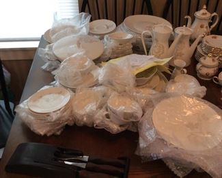 97 pieces Rosenthal Germany china                                                 Classic Rose [ Raymond Loeway.  $ 600.00                               10 dinner, 12 Salad, 17 cups, 12 saucers, 12 bread and butter, 12 soup bowls, 12 small (berry,dessert,finger) bowls, covered casserole with metal stand, large vegetable serving bowl, large oval serving platter, small oval serving platter, celery platter, gravy bowl, tea pot, coffee pot, cream and sugar