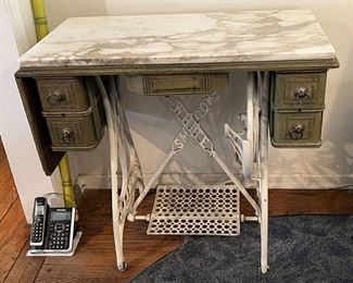 MARBLE TOPPED ANTIQUE SEWING MACHINE TABLE/ DESK. (THE MARBLE TOP IS REMOVEABLE.)