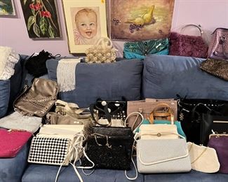 Large selection of vintage, antique & contemporary handbags, clutches & coin purses. Includes: mink, leather, beaded, cloth, disco, wicker & more